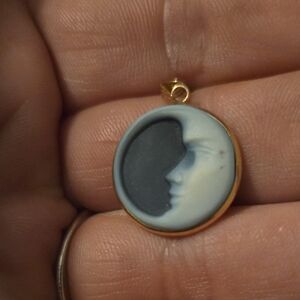 Elegant Gold and Black Cameo Pendant
